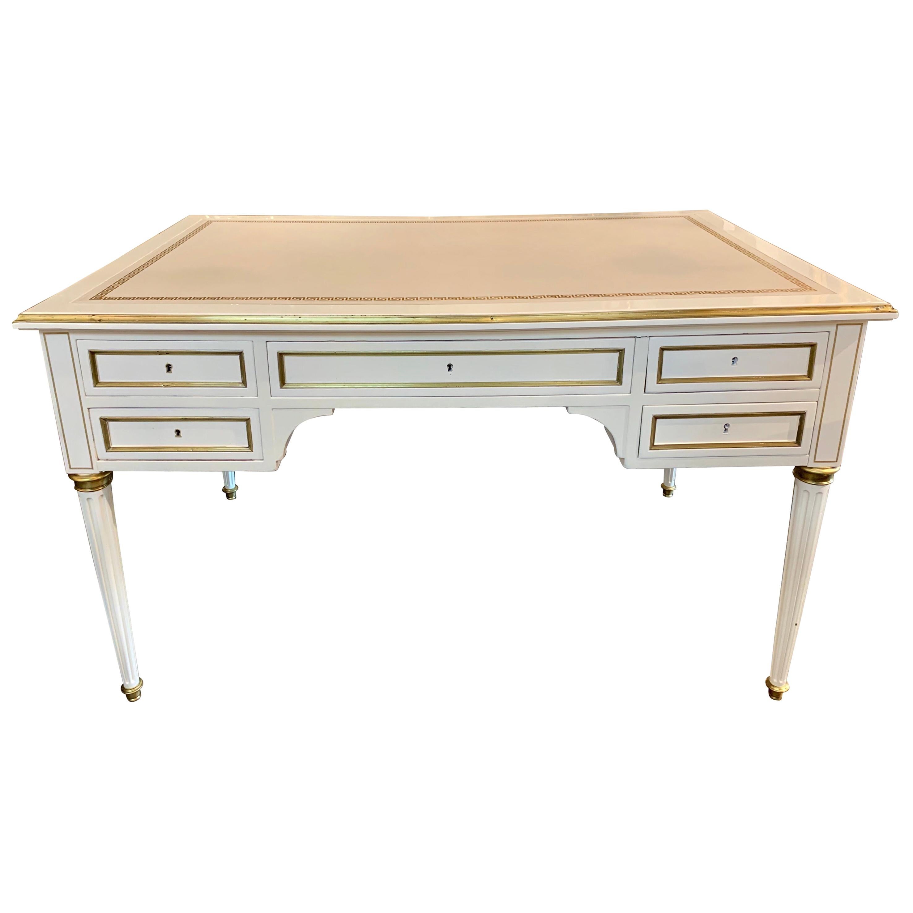 French Jansen Style White Lacquered and Brass Trim Desk with a Leather Top