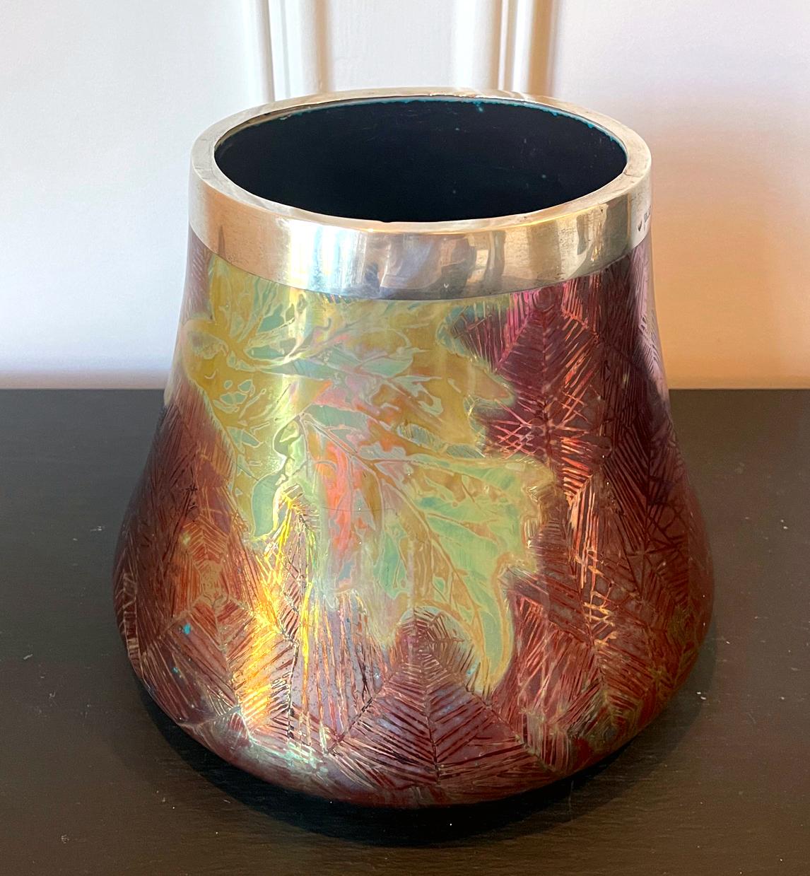 A ceramic vase with iridescent glaze in the shape of an elephant foot cache pot by the legendary French ceramist Pierre Clement Massier (1845-1917). Massier is widely considered as the founder the modern ceramic industry of Vallauris, Southern