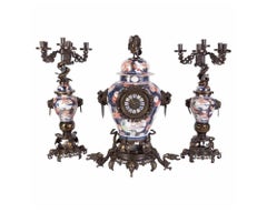 French Japonisme Parcel-Gilt Patinated Bronze Imari Porcelain Clock Garniture