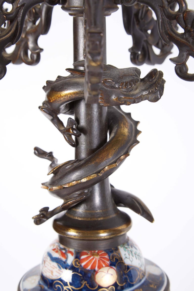 French Japonisme Parcel-Gilt Patinated Bronze Imari Porcelain Clock Garniture 4
