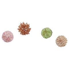 Vintage French jewelry artist. Four designer rings in metal and plastic. Flower designs.