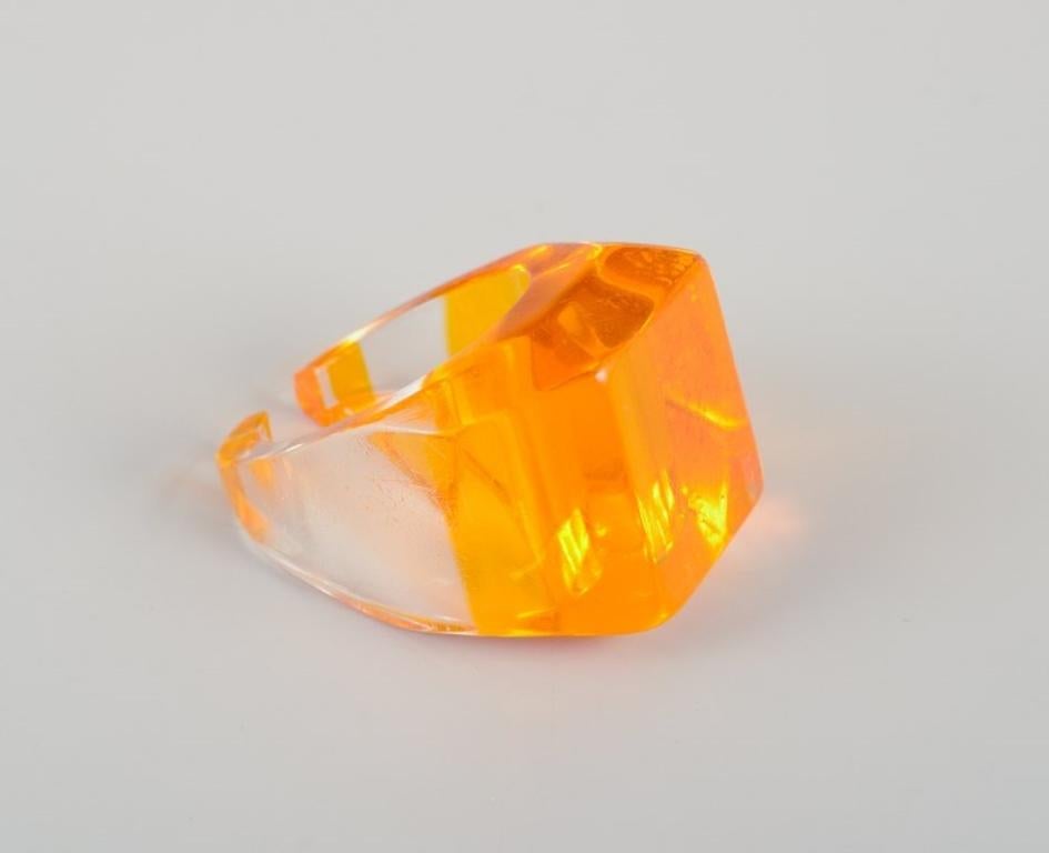 French jewelry artist. Four designer rings in plastic. 
Striped design with various colors.
1960s/1970s.
In excellent condition.
Dimensions: Diameter 15.5 mm - 18.5 mm.
US size 5-8