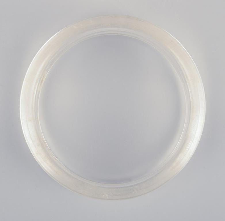 Women's French jewelry designer. Four bracelets in clear plastic. Late 20th C. For Sale