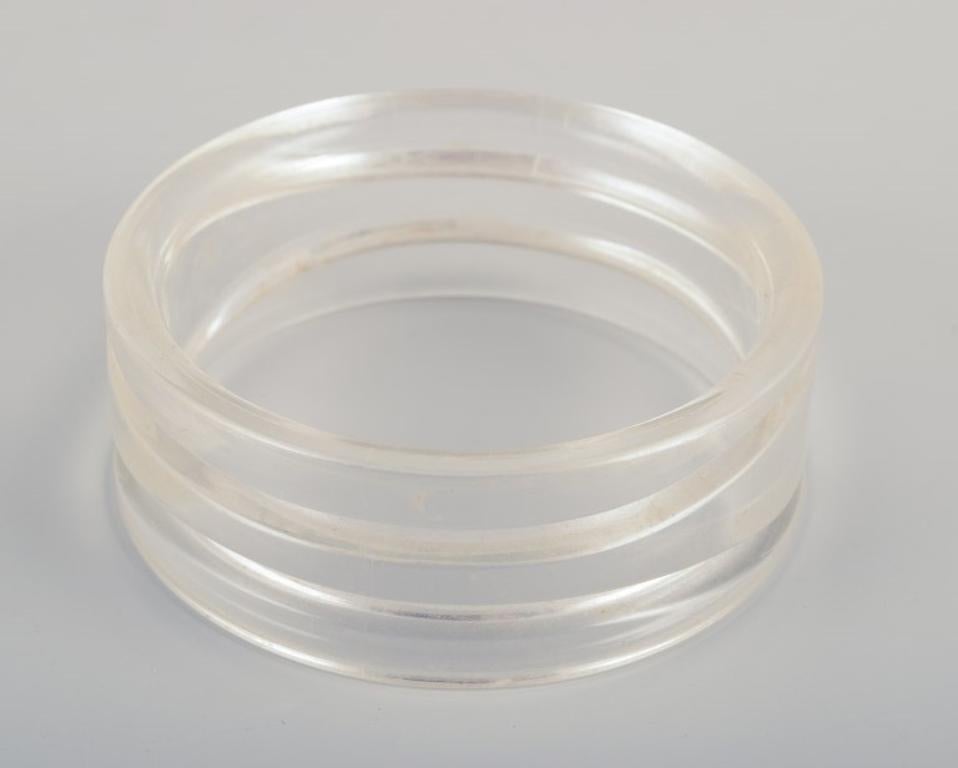 French jewelry designer. Four bracelets in clear plastic. Late 20th C. For Sale 4