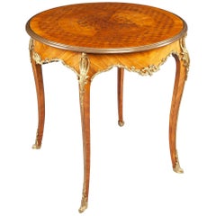Mesa auxiliar redonda francesa de madera de rey y parqués de bronce dorado, S. XIX