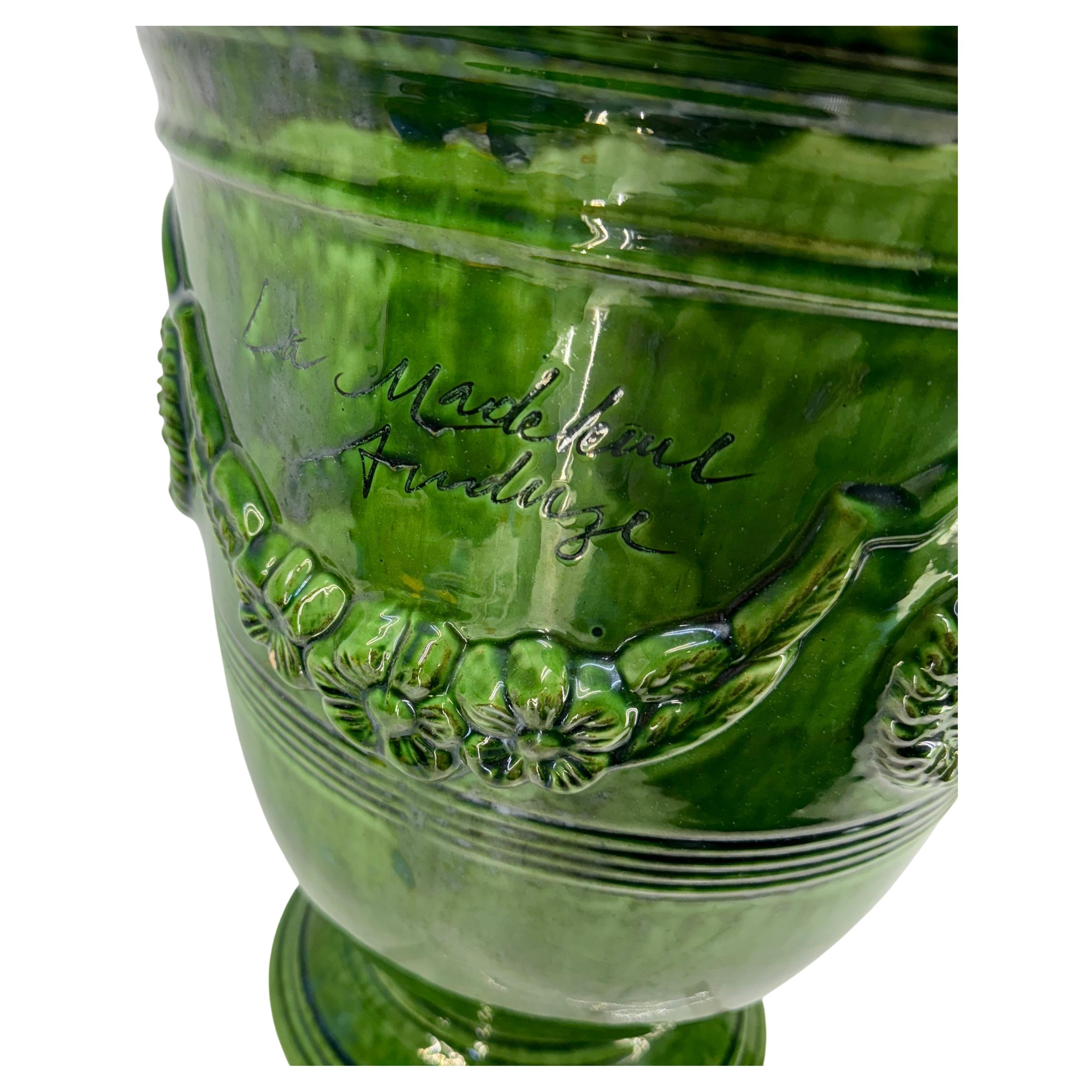 Tall Green La Madeleine Planter from France. Anduze in the South of France is very well known for its large glazed garden planters and the technique of the handmade pottery that began in the 17th Century. Urns are the larger planters that are often