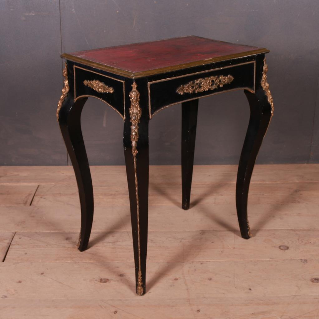 Late 19th C French original black lacquer and gilt one drawer lamp table with leather top. 1890.

Dimensions
24 inches (61 cms) wide
17 inches (43 cms) deep
29 inches (74 cms) high.