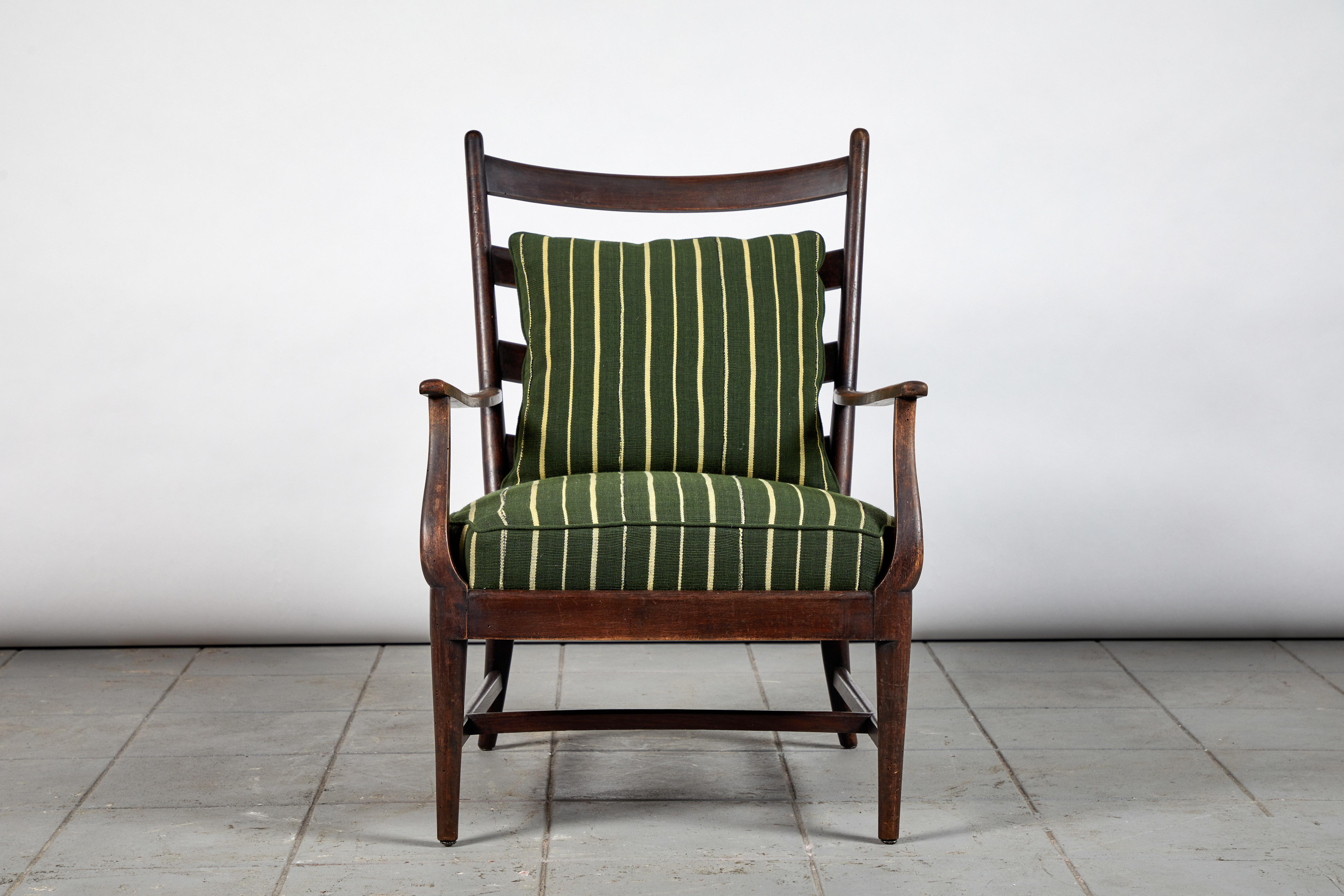 French ladder back armchair upholstered in green and natural striped African fabric.