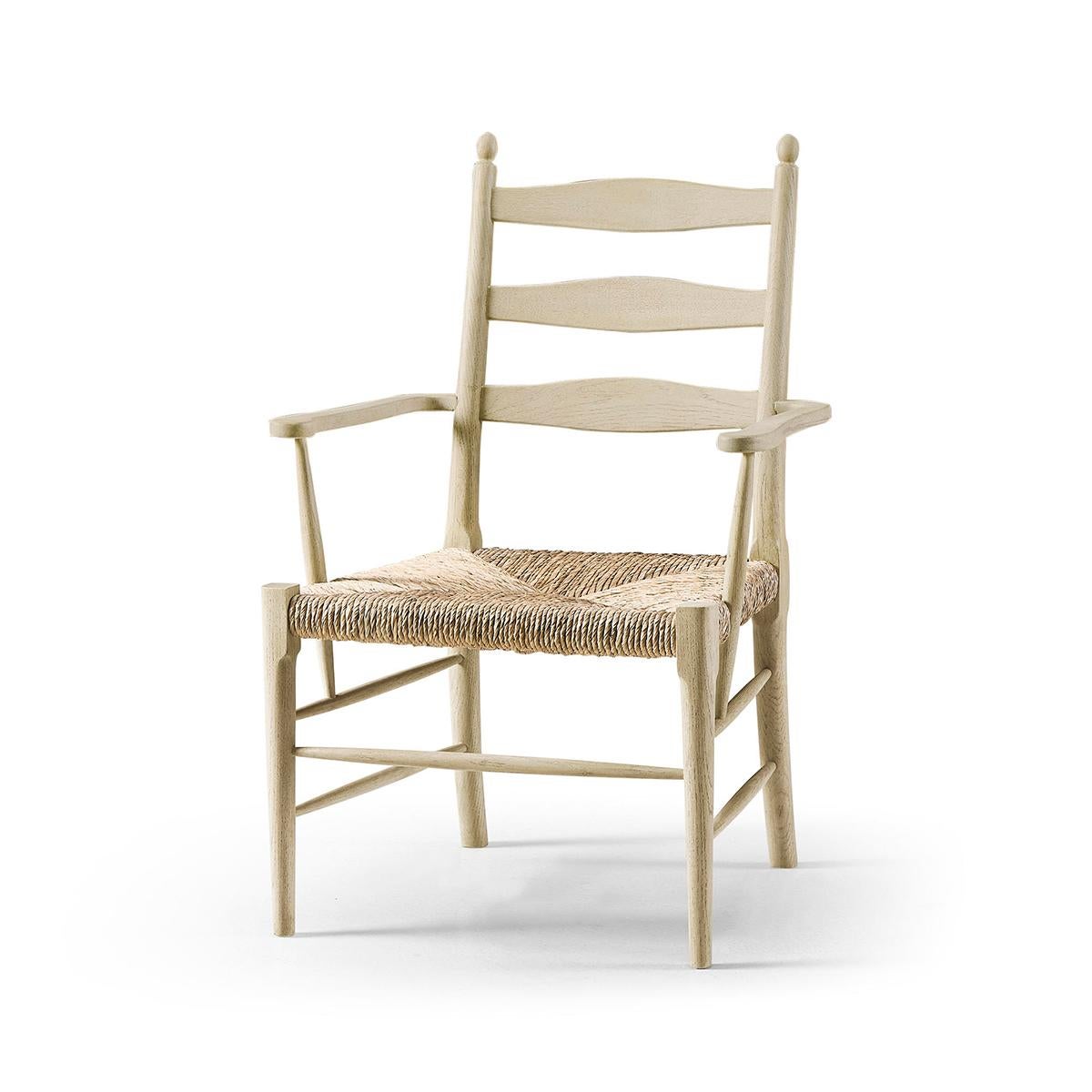 A masterpiece of comfort and rustic elegance. This chair boasts a robust stripped oak frame that reveals the exquisite natural grain and charm of the wood, evoking a sense of traditional beauty. Wrapped in creamy oatmeal performance fabric cushions,
