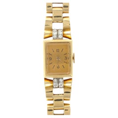 Reloj de pulsera mecánico retro francés de oro amarillo con diamantes, años 40