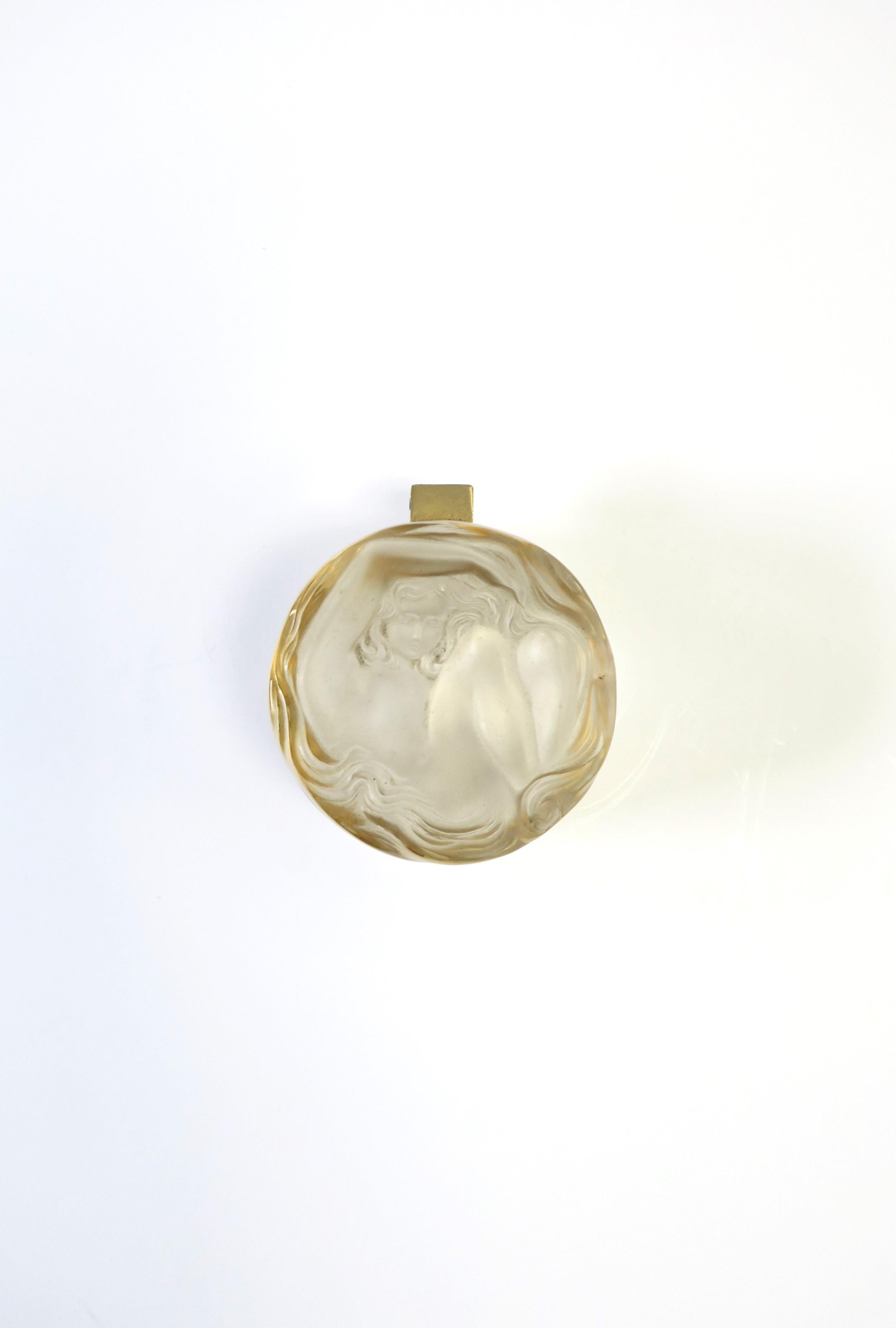A beautiful and substantial French crystal and brass box with female figure by luxury design Maison, Lalique, in the Art Nouveau style, circa mid to late-20th-century, France. Crystal is clear with a matte translucent surface and brass hardware. A