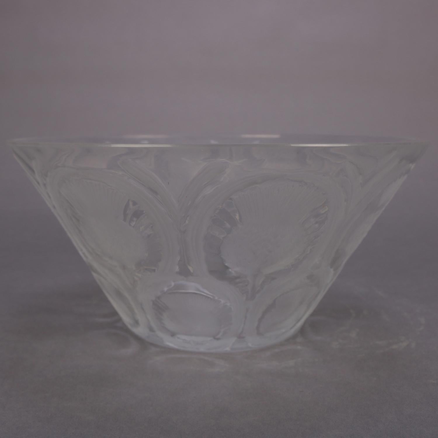 French center bowl by Lalique features flared form with frosted and clear embossed repeating pattern of thistles, signed on base rim, 20tth century.

Measures: 5