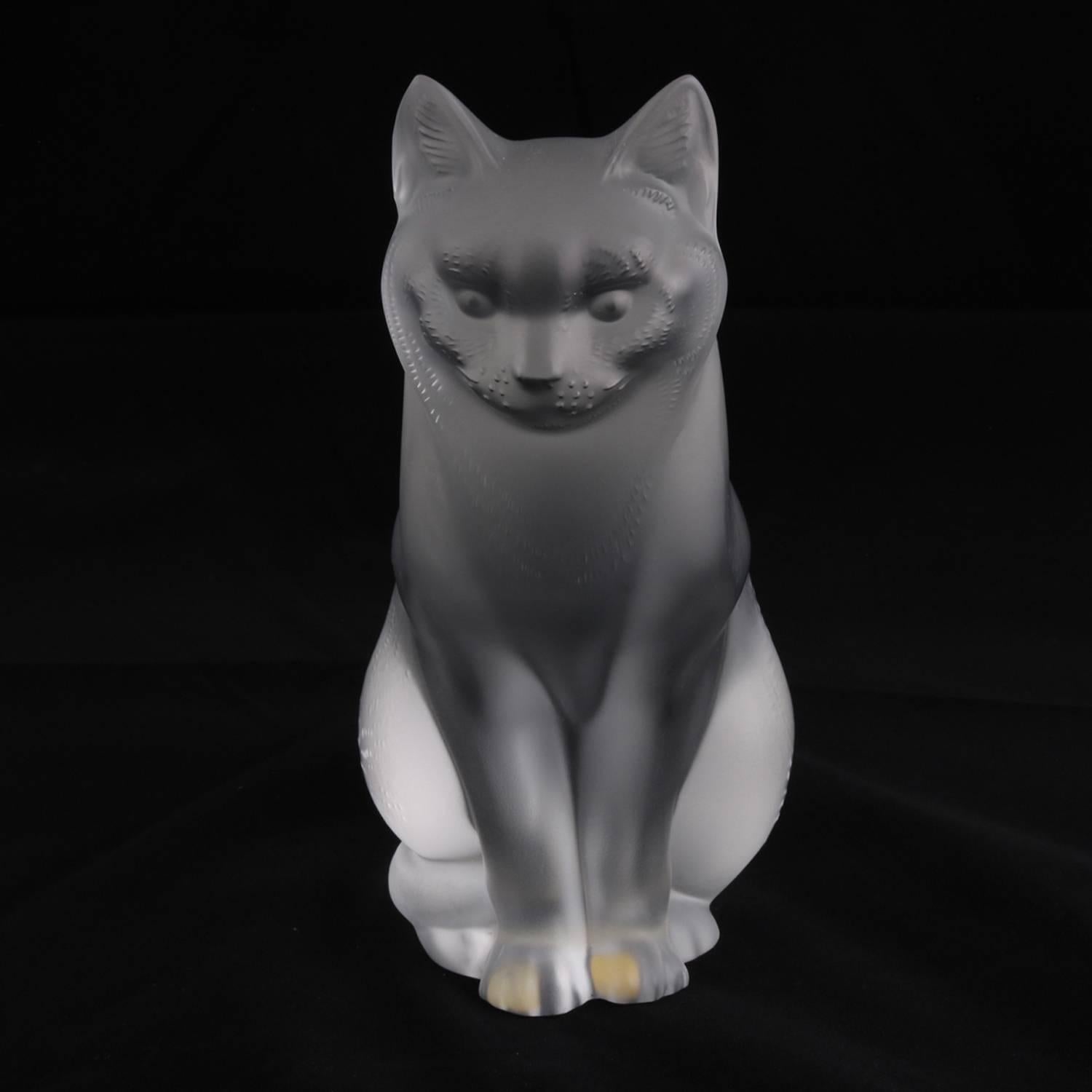 French Lalique figural animal sculpture of a sitting cat executed in frosted crystal, Lalique style no: 1160300, signed on base and with original made in France label, 20th century.

Measures: 8.5