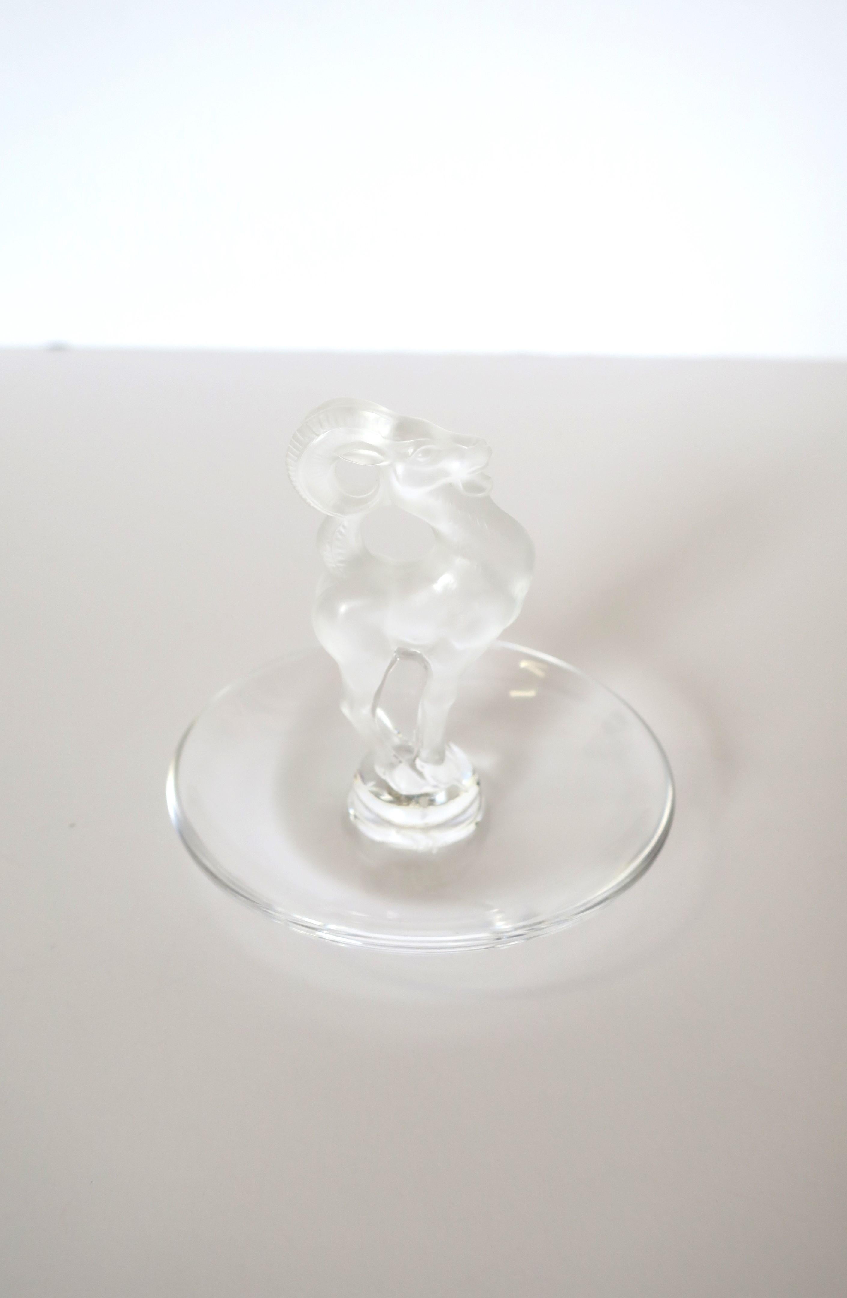 A beautiful crystal 'Gazelle' antelope jewelry dish vide-poche from French luxury maker, Lalique, circa late-20th century, France. This crystal Gazelle antelope animal is frosted, and dish area is transparent. A great piece for a vanity, dresser,