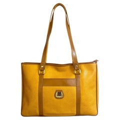 Bolso francés Lancel - cuero - mostaza y marrón - vintage - moda - París
