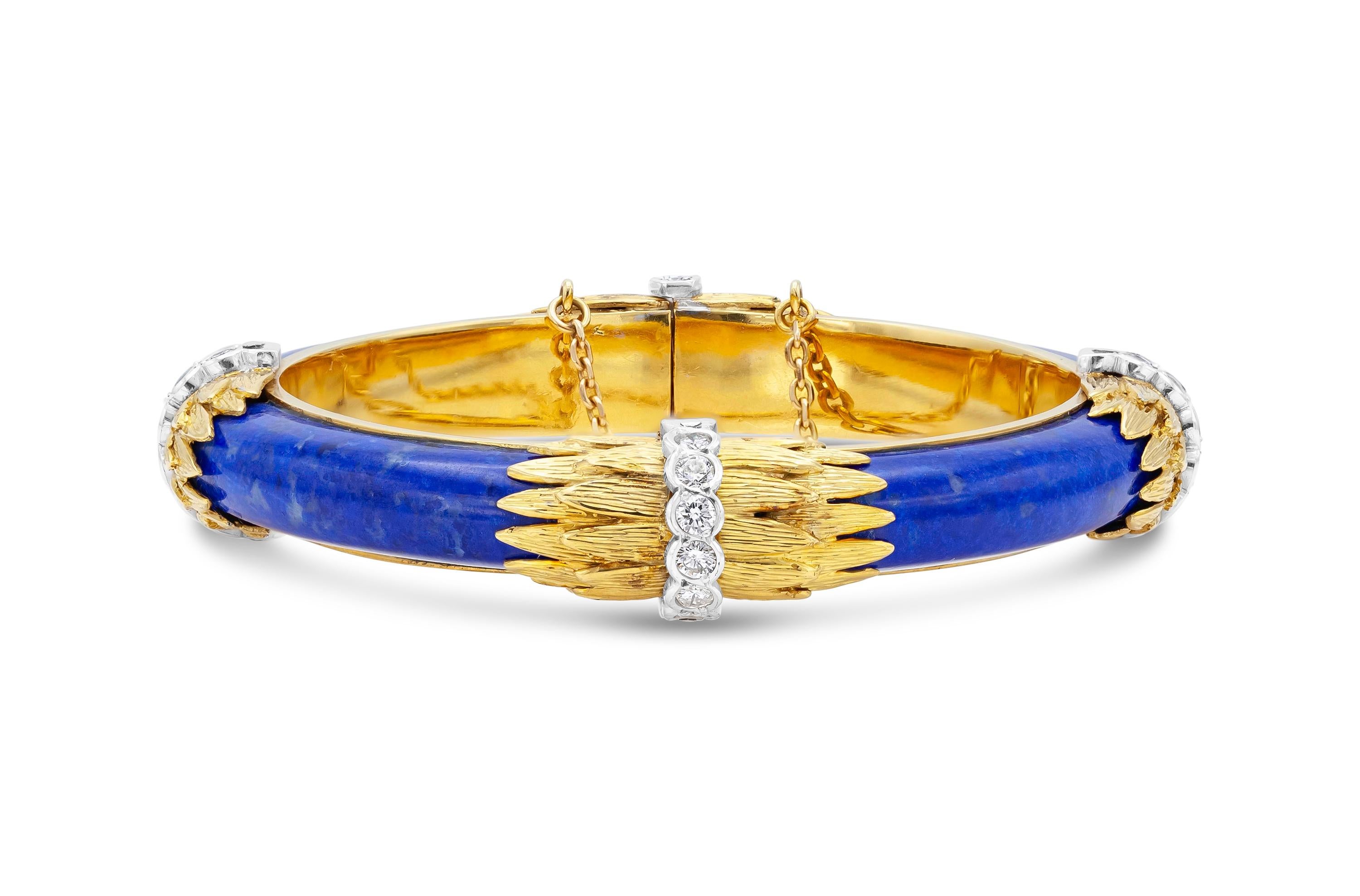 Finely crafted in 18K yellow gold with Lapis Lazuli and round-cut diamonds weighing approximately a total of 1.30 carats.
French hallmarks
Size 6 1/2 inches.