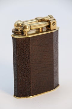 French large Art Deco brass and leather table lighter by Polaire of Paris c 1920