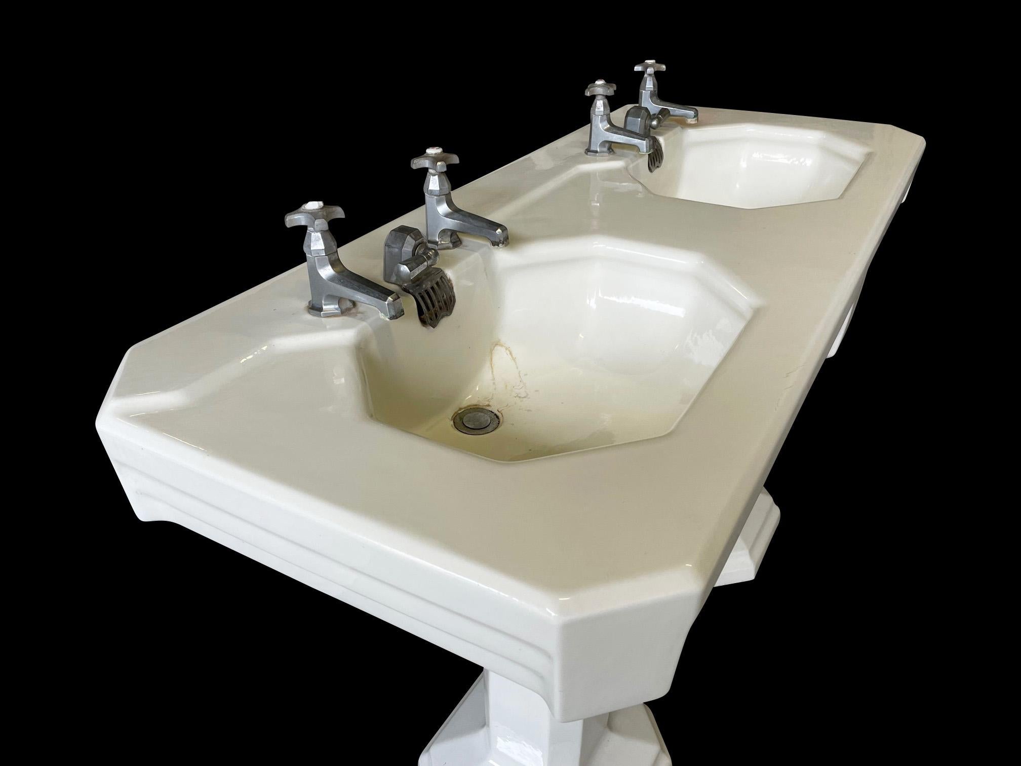 French large Art Deco Double Sink, by Porcher, Paris. A very unusual and rare model, some age related marks, the taps are original and untested, they will need to be refurbished. The lever operated wastes are original and will also require