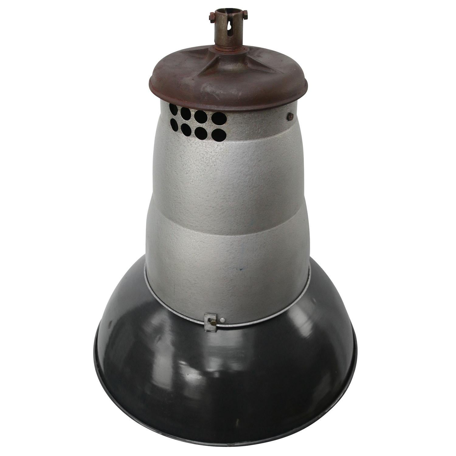 Industrial enamel pendant by Mazda, France
Black enamel shade, metal middle part with cast iron top

Weight: 6.40 kg / 14.1 lb

Priced per individual item. All lamps have been made suitable by international standards for incandescent light