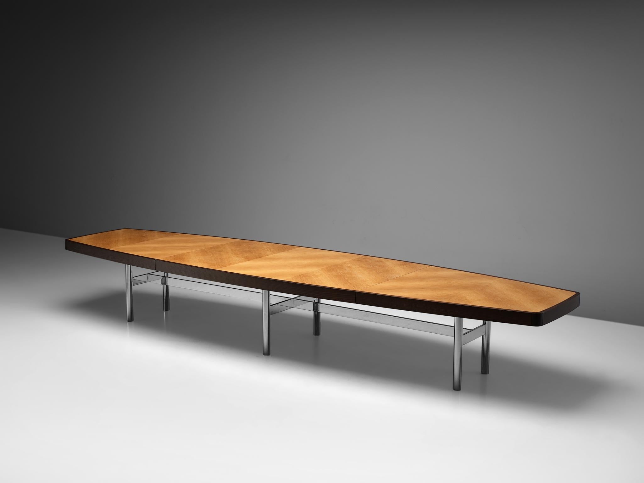 Boat shaped conference table, metal and beech, France, 1970s

This large boat or barrel shaped table is designed in a modernist, simplistic style. The table is robust and strong and has six steel legs that support the top. The thick tabletop has a