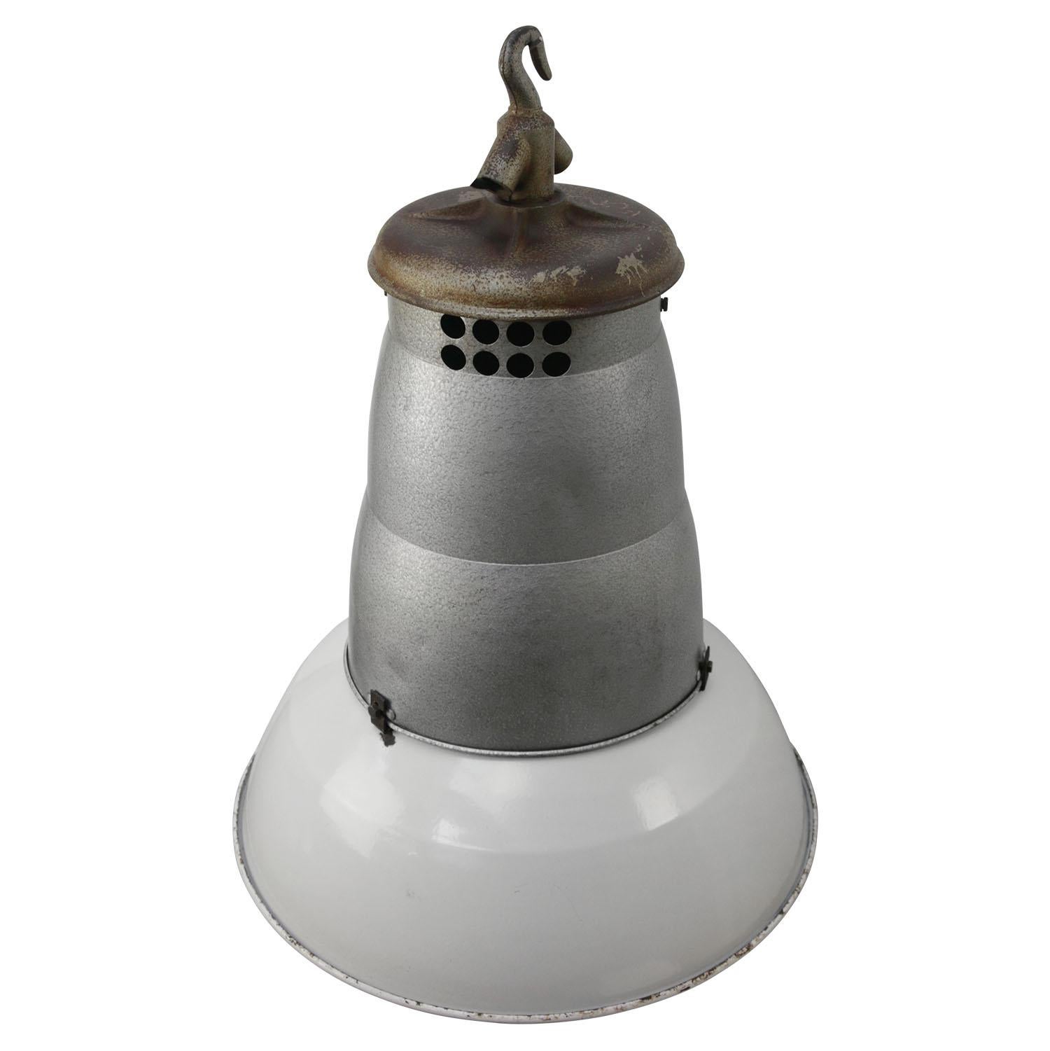 Industrial enamel pendant by Mazda, France
Very light grey enamel shade, metal middle part with cast iron top

Weight: 6.40 kg / 14.1 lb

Priced per individual item. All lamps have been made suitable by international standards for incandescent