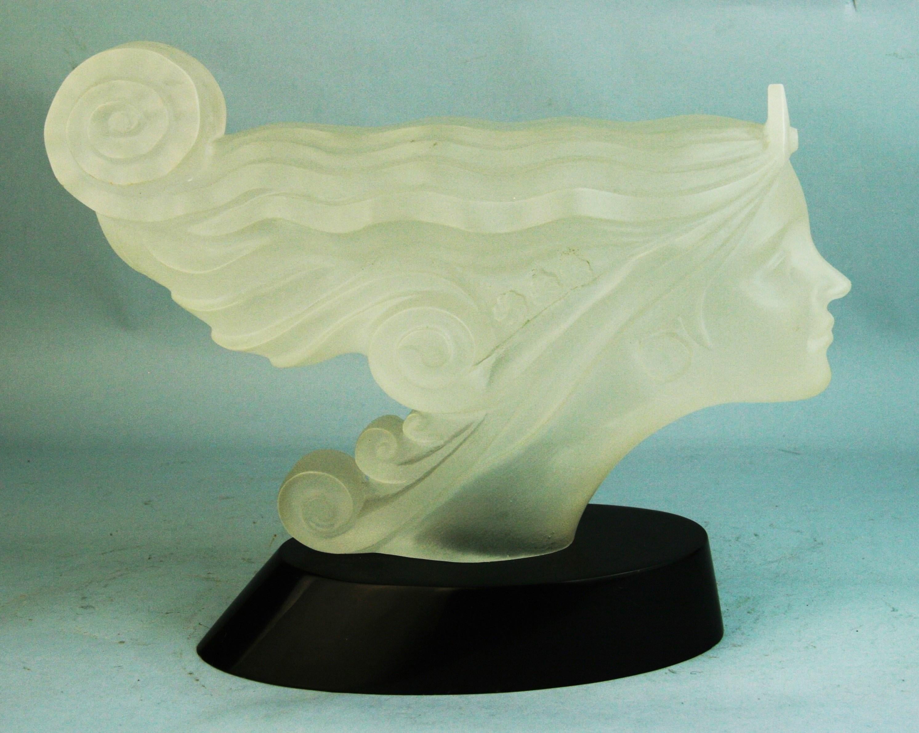 1215 Frosted acrylic casting of an Art Deco style car mascot hood ornament on a black acrylic base.