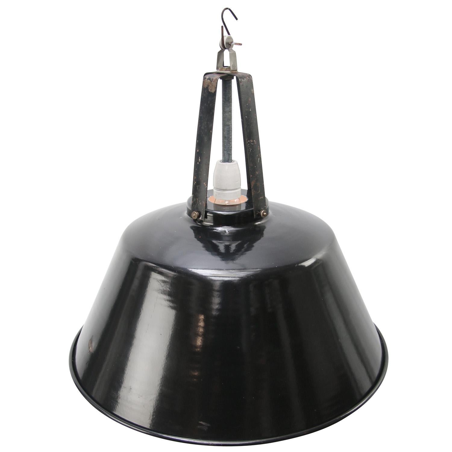 Black enamel Industrial pendant.
Iron top. White interior.

Weight: 4.00 kg / 8.8 lb

Priced per individual item. All lamps have been made suitable by international standards for incandescent light bulbs, energy-efficient and LED bulbs. E26/E27