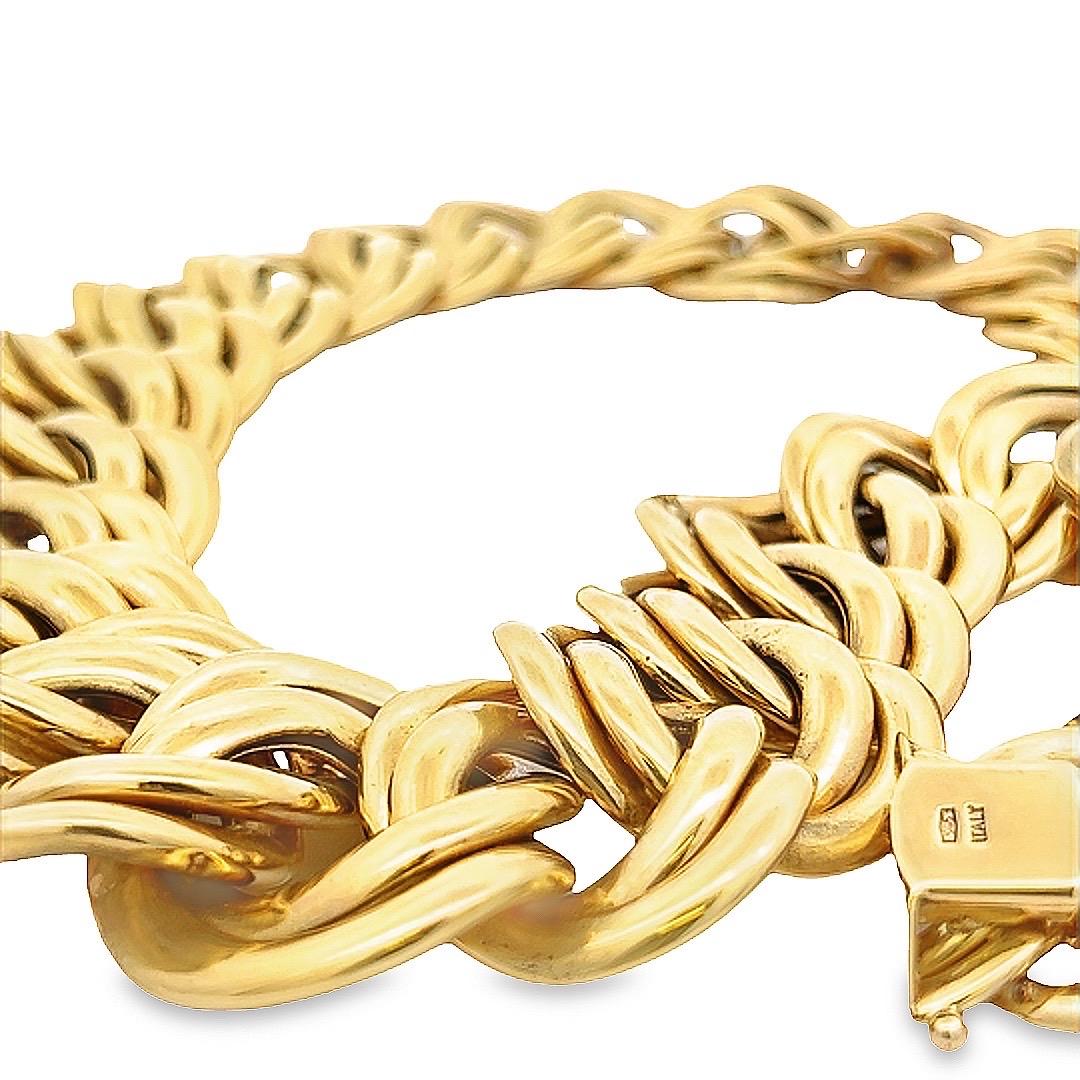 This retro vintage 14 karat yellow gold Cuban link chain necklace is made with high-quality Italian craftsmanship, variable chain width, and is a fashionable piece of jewelry. It is designed in the popular Cuban chain link style, known for its