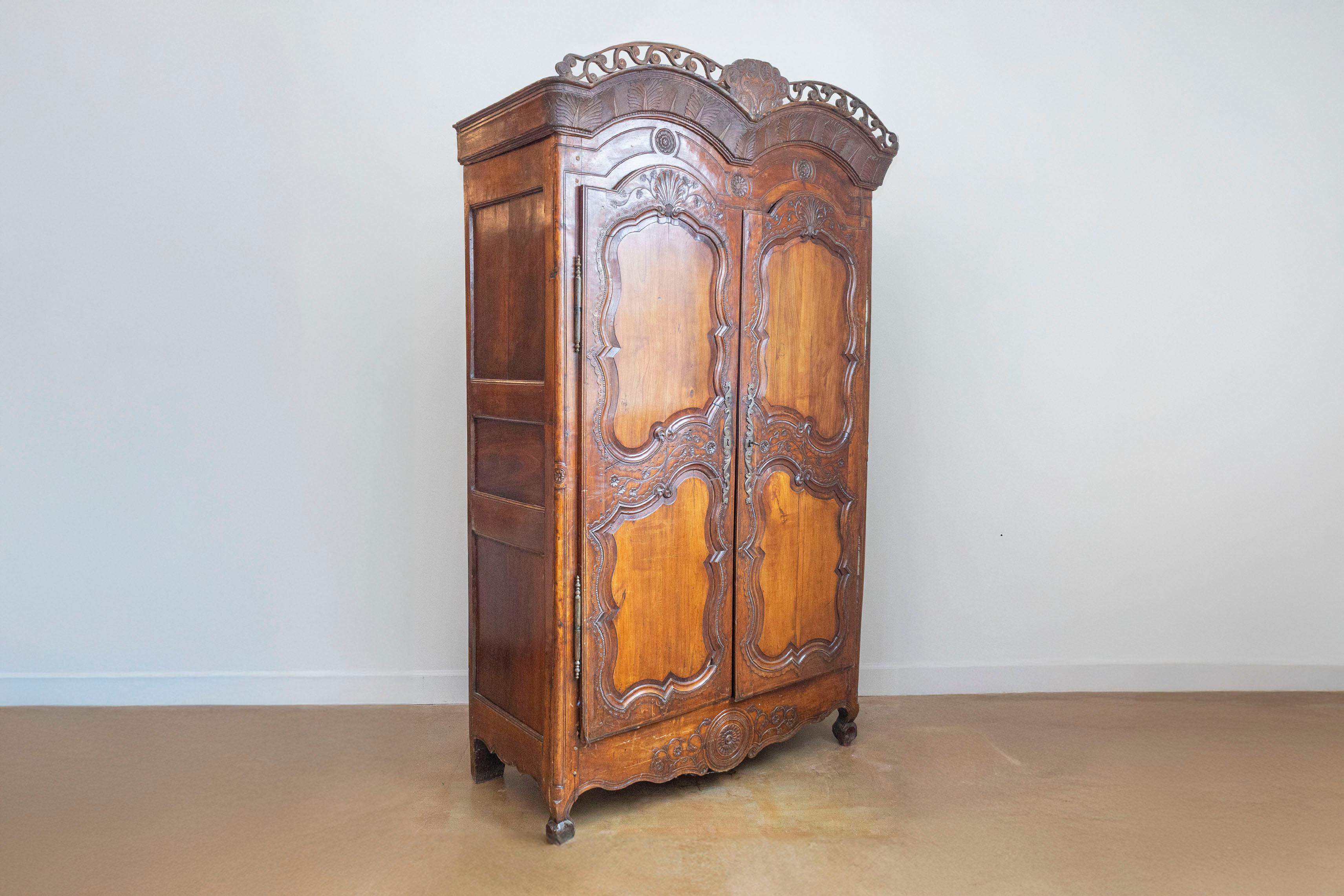 French Late 18th Century Cherry Armoire from Rennes with Hand Carved Décor 8
