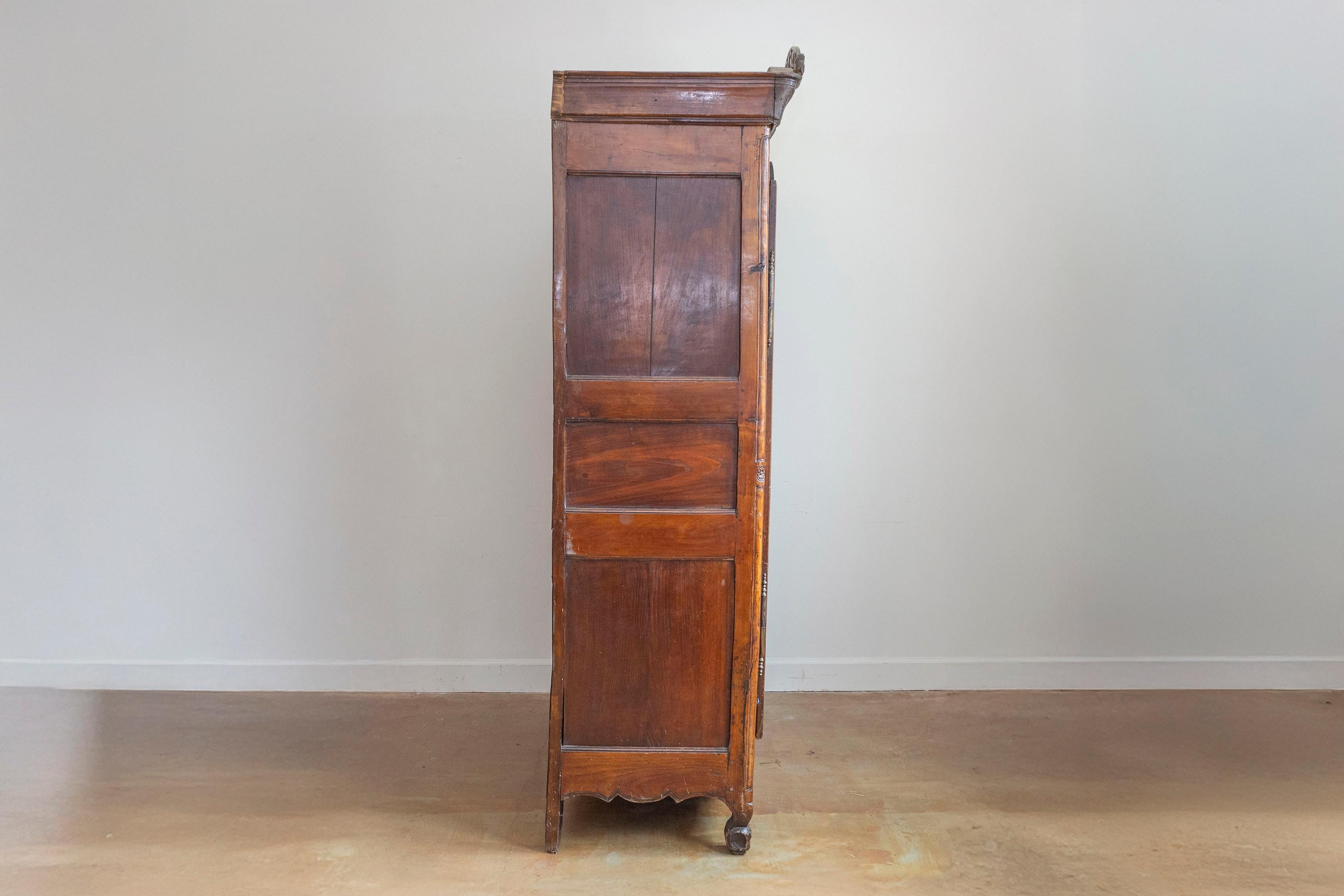 French Late 18th Century Cherry Armoire from Rennes with Hand Carved Décor 9