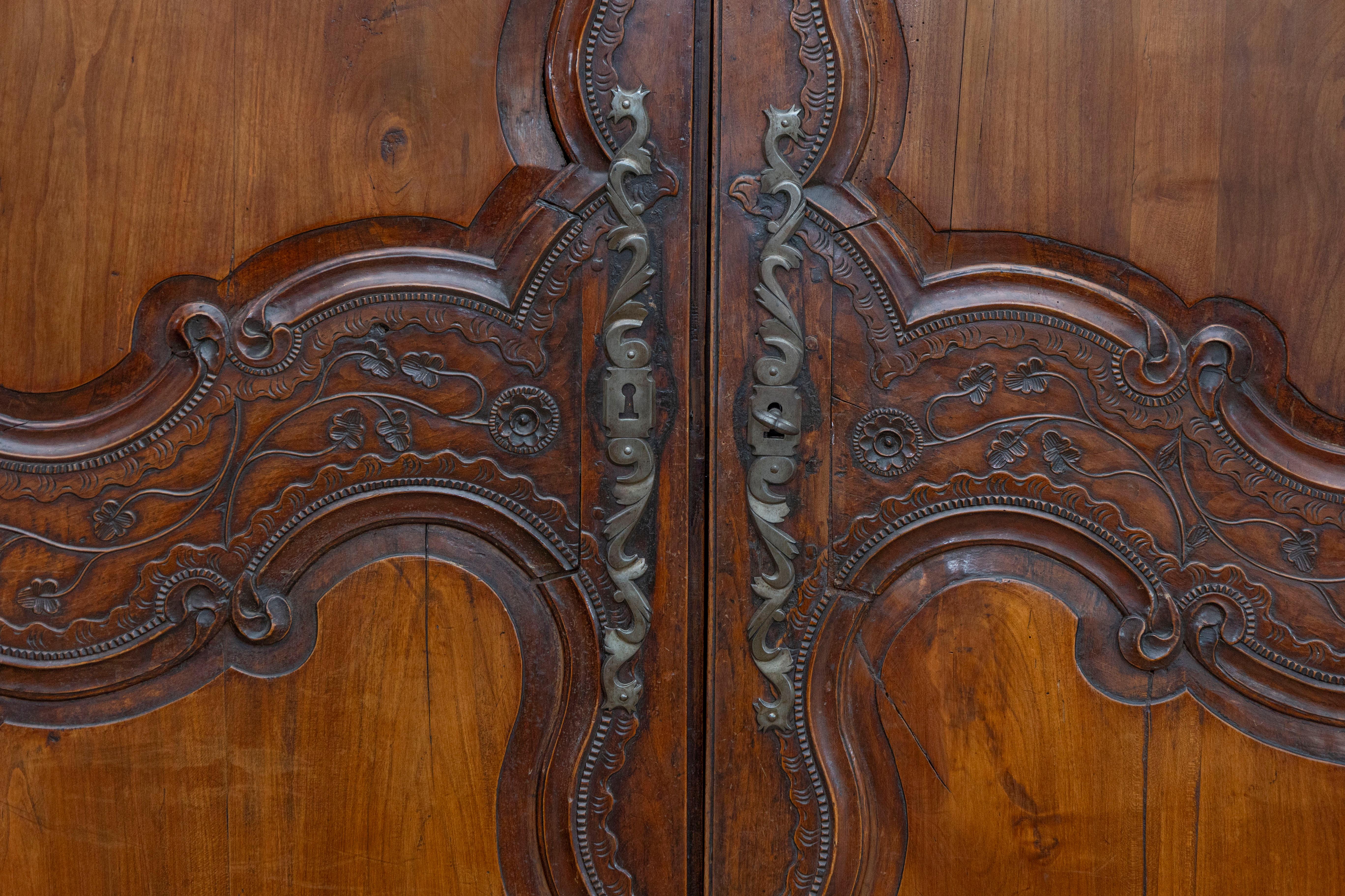 18th Century and Earlier French Late 18th Century Cherry Armoire from Rennes with Hand Carved Décor