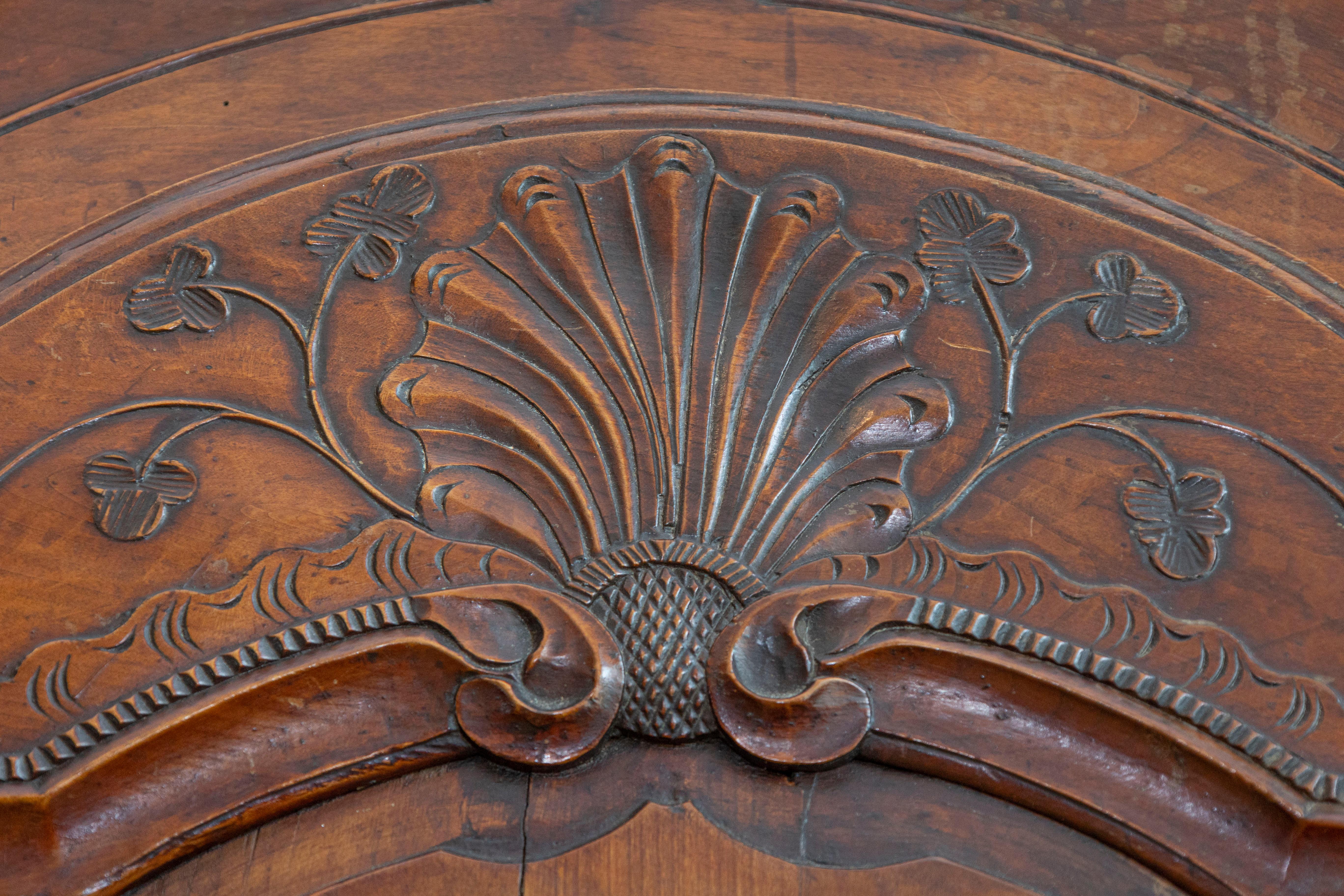 French Late 18th Century Cherry Armoire from Rennes with Hand Carved Décor 2