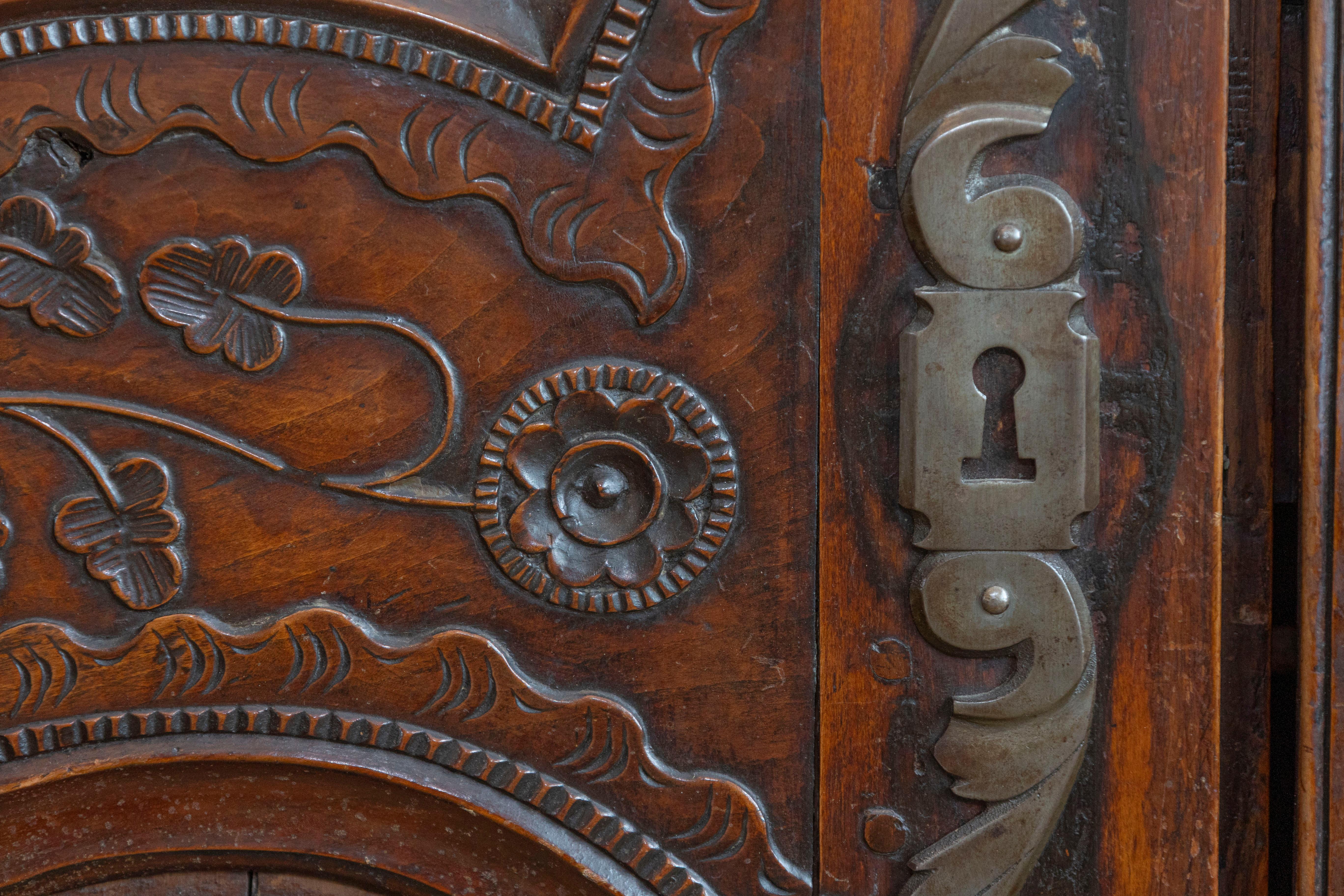 French Late 18th Century Cherry Armoire from Rennes with Hand Carved Décor 4