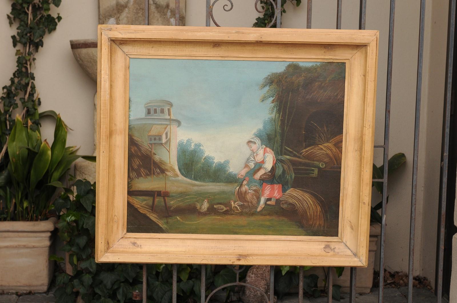 A French oil on canvas country scene from the late 18th century, set inside a pine frame. Born in France during the later years of Louis XVI's reign, this charming scene depicts a farmer feeding her chickens. The subtle use of curving lines leads