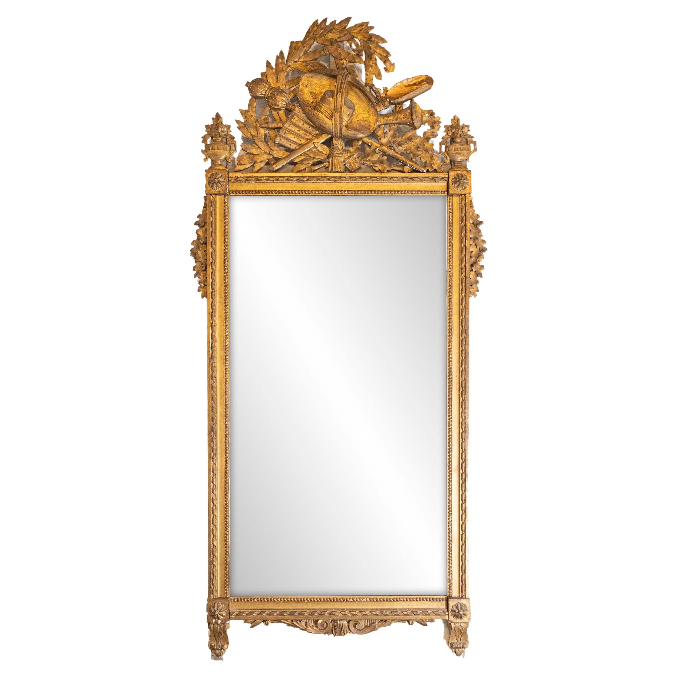 French Late 18th Century Louis XVI Period Giltwood Mirror with Carved Crest