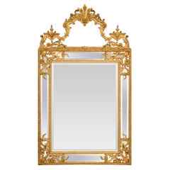 Specchio francese della fine del XVIII secolo in stile Regence con doppia cornice in legno dorato