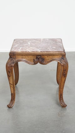 French late 18th century side table with a wooden frame and a marble top