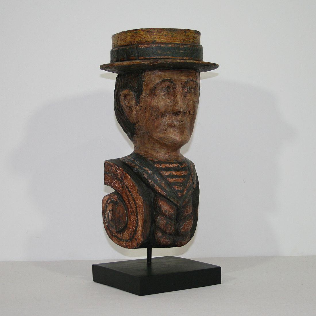 Beautiful Folk Art object representing the head of a sailor.
France, circa 1880-1900.
Weathered, small losses and old repairs.