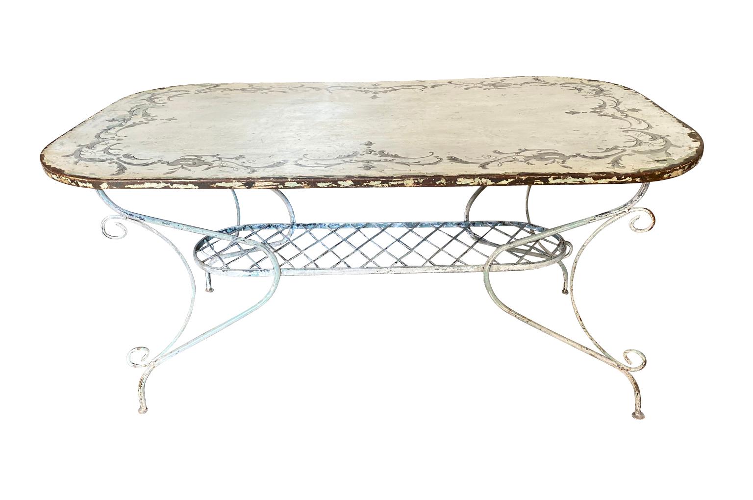 A very charming later 19th century garden table from the Provence region of France. Wonderfully constructed from beautifully painted iron. A delightful addition to any garden or interior. A perfect breakfast table.