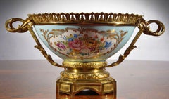 A French Late 19th Century Gilt Metal Mounted Hand Painted Porcelain Bowl