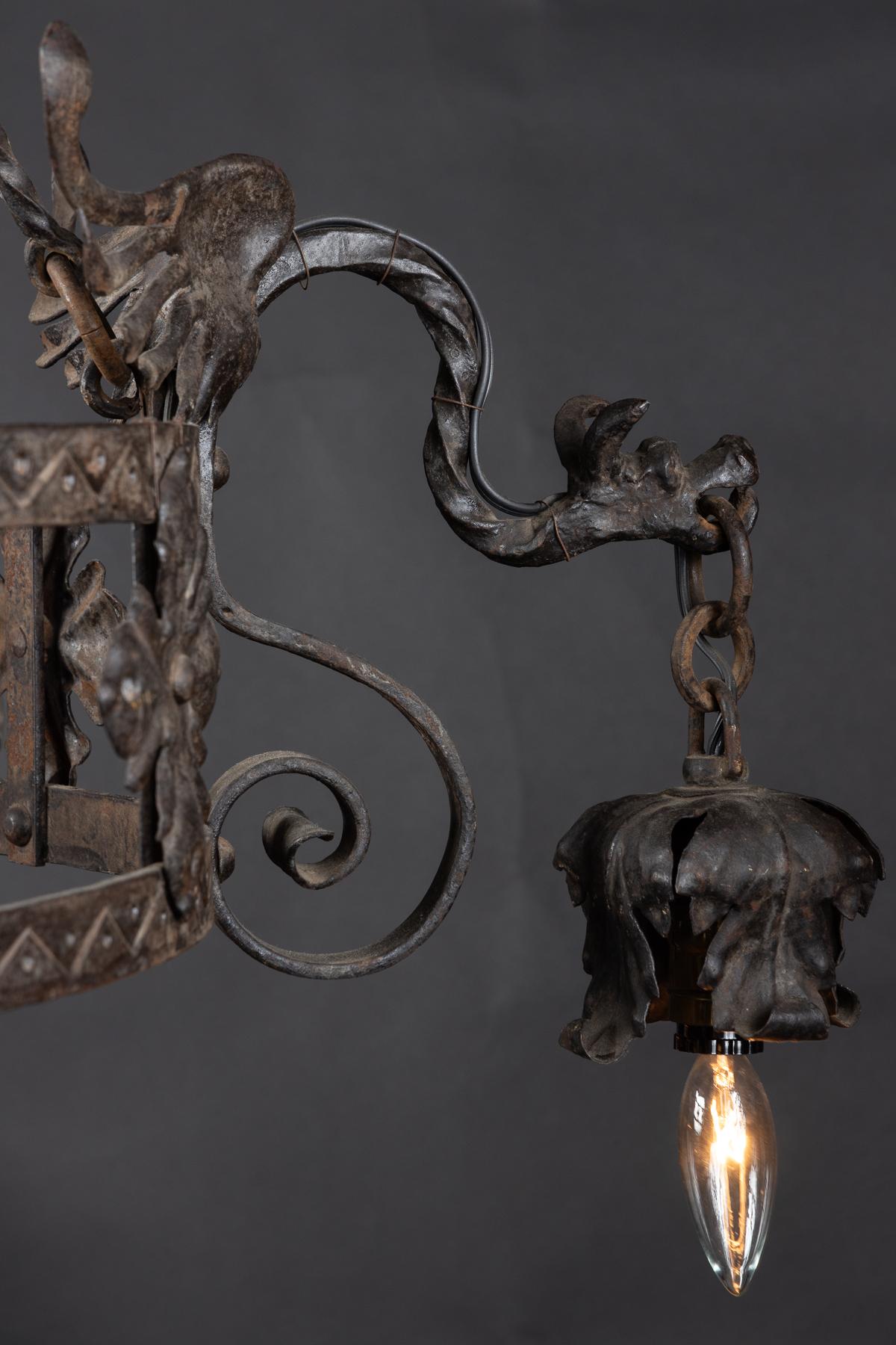 Iron French late 19th century Gothic Revival iron chandelier with Winged Dragons For Sale