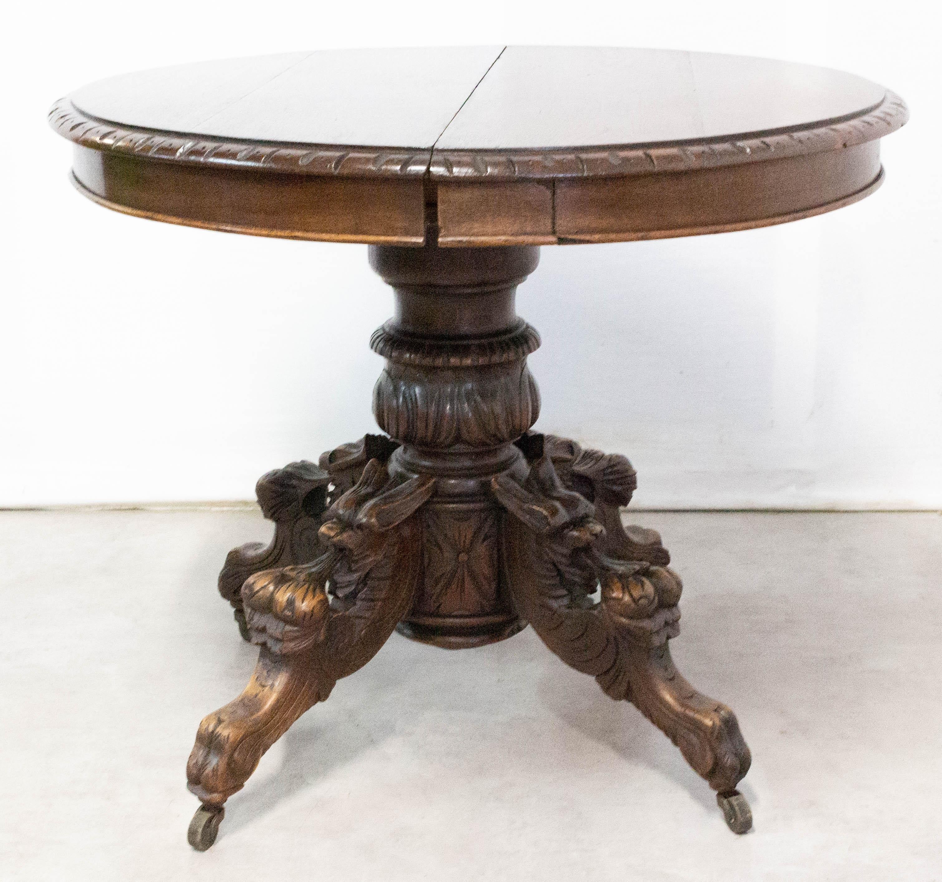 Pedestal table with grotesques, side table, French late 19th century.
Raised on four swept legs.
Hand carved oak.
The table legs are mounted on casters.
We can make at your request extends for an addition of 450 €
Good antique condition with