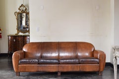 French Late Deco Period Leather Upholstered Four Cushion Sofa, ca. 1940