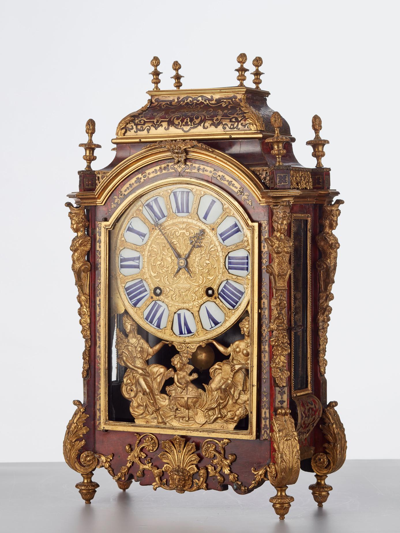 A good and impressive late Louis XIV boulle inlaid Religieuse mantel clock with richly ormolu mounted bronzes signed C Bonneual a Paris.

The strong Classic Louis XIV Influenced good looking strong case - this design of the case was very popular in