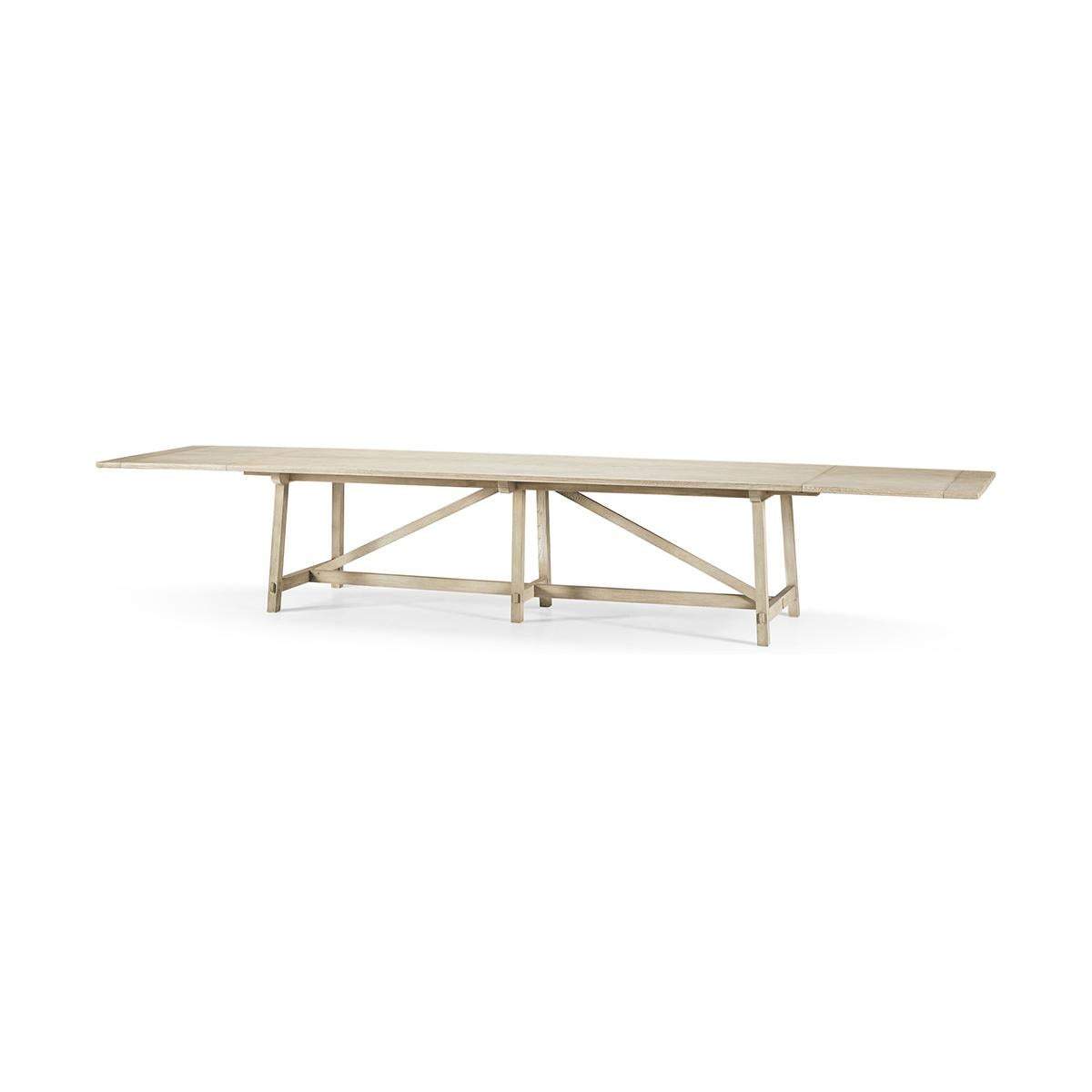 The French Laundry dining table is the perfect combination of unparalleled furniture craftsmanship, elegant functional solutions, and inspiring design. Powerful honed forms in stripped oak elicit a raw appreciation for natural materials and offer a