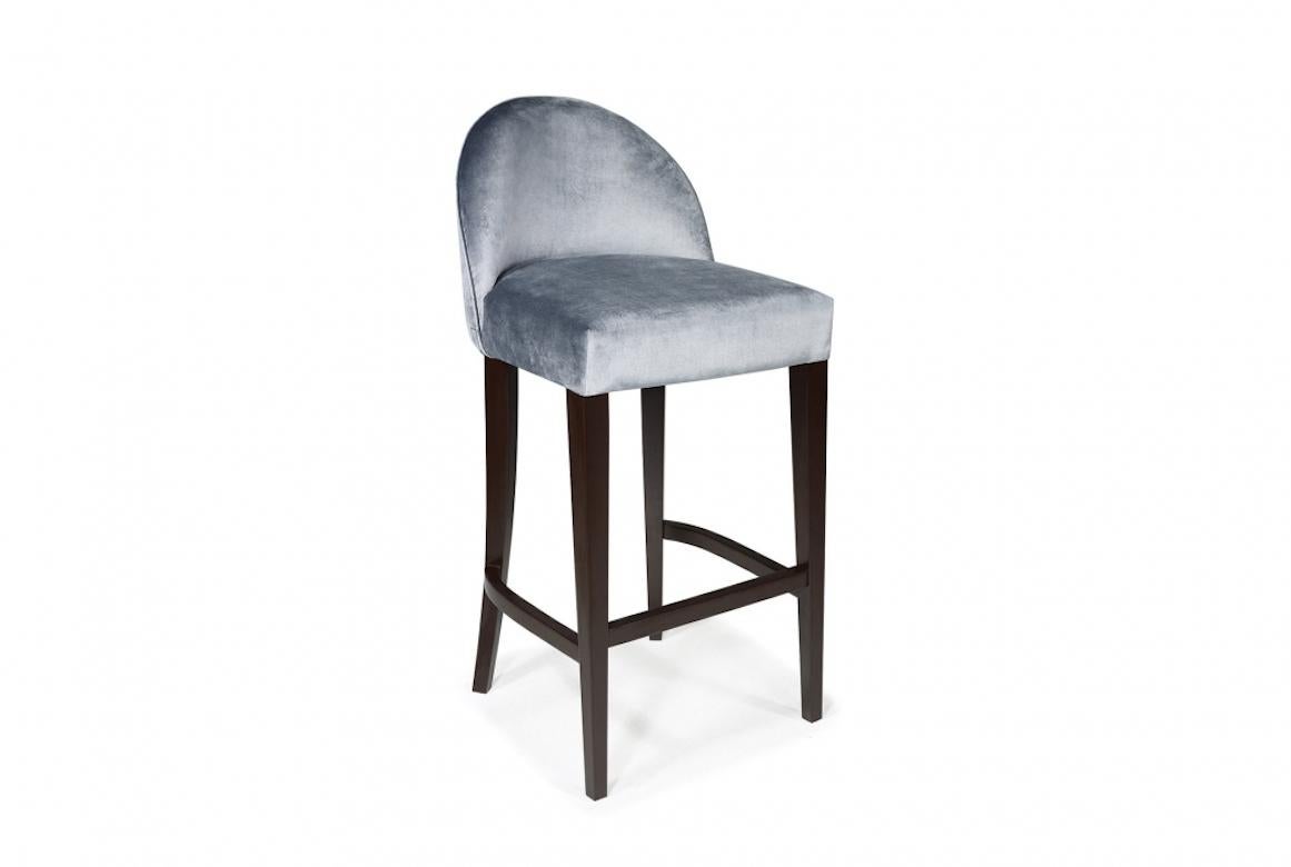 A stunning French leach stool, 20th century.

Leach is a contemporary bar stool with an elegant curved upholstered back. Shown in cherrywood with an ebonized wood finish.

Handcrafted in cherrywood, oak, mahogany or painted. Hand painted in an