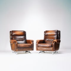 French Leather and Chrome Recliners - Two Available