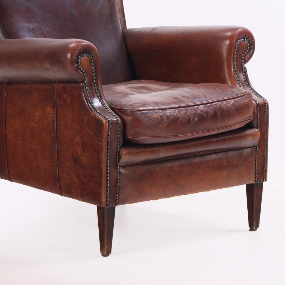 French leather club chair, C. 1960. In Good Condition In Philadelphia, PA