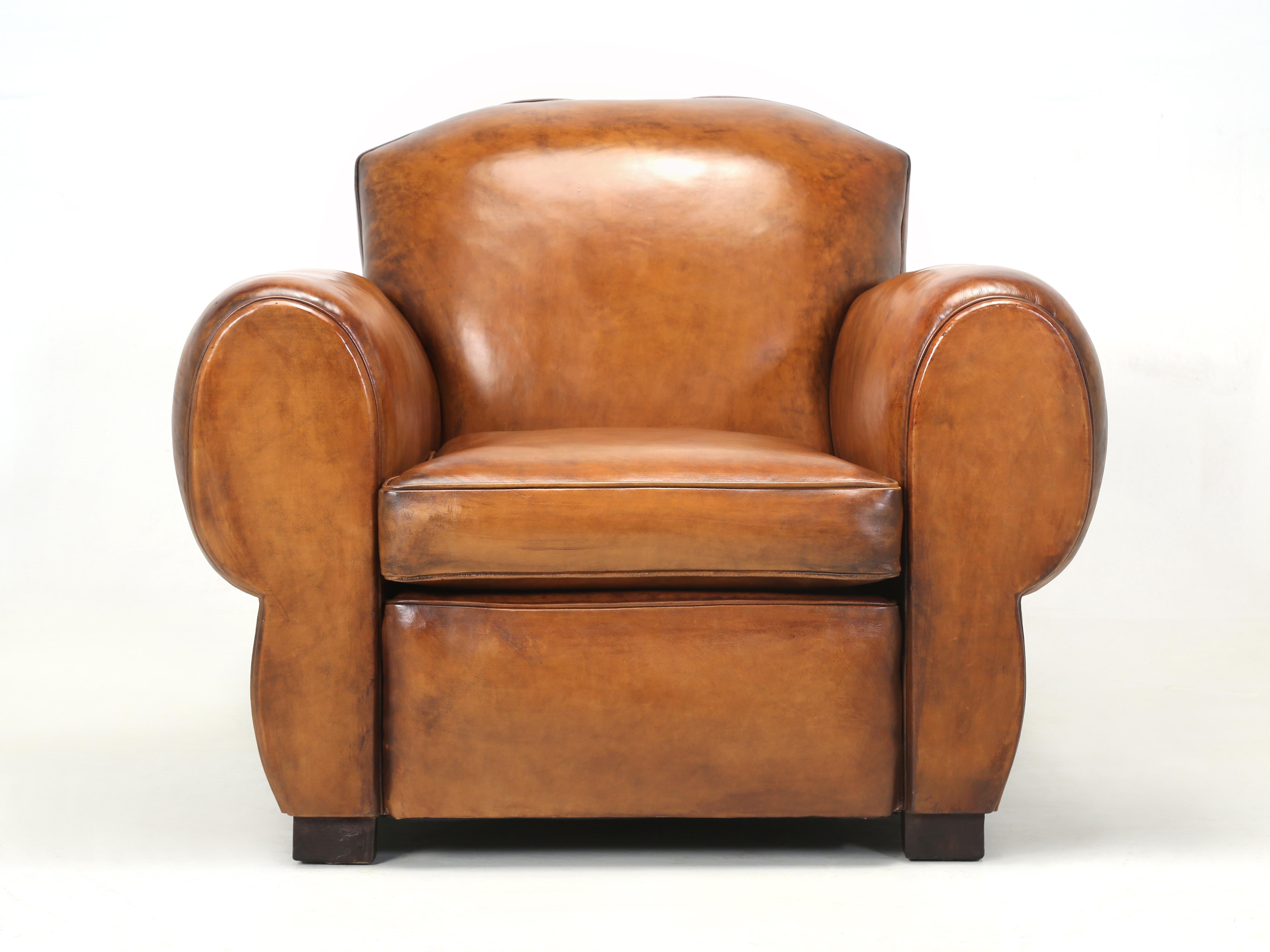 French Art Deco Moustache Style Club Chair from the 1930's. Certainly one of the more iconic designs from the Art Deco era and a true French classic if there ever was one. Our inhouse Old Plank upholstery department completely disassembled this