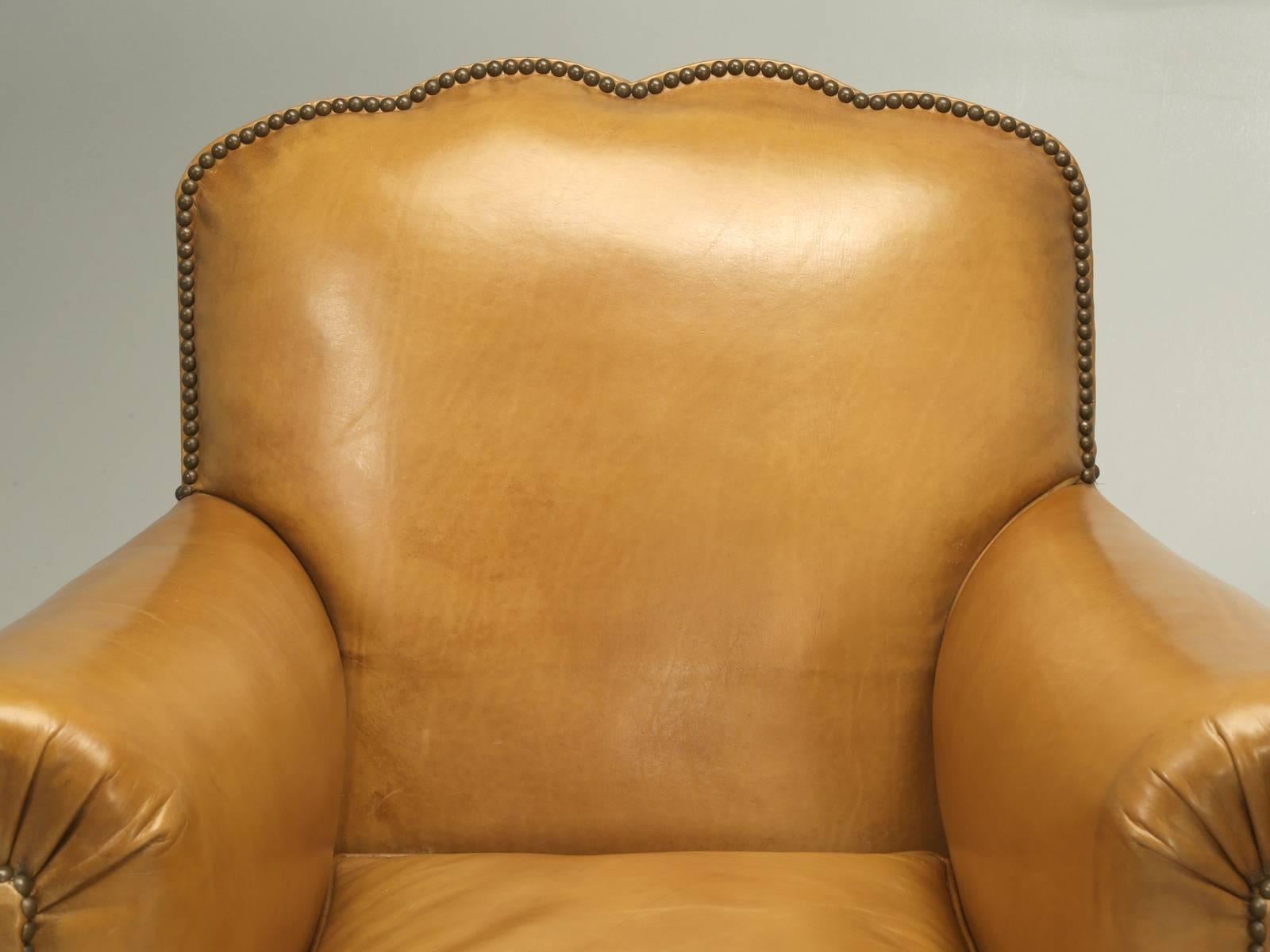 Generally, we are able to tell you how we managed to conserve and save the original leather, on our French leather club chairs, but this pair of French club chairs, lost the battle with the house cat. We tried, but in the end, we had to completely